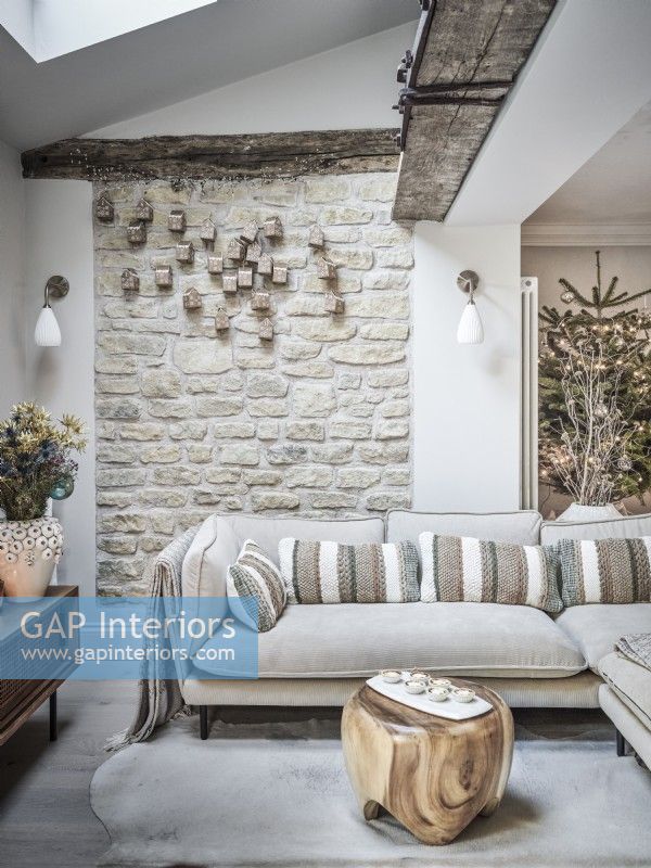 Exposed brickwork wall in neutral seating area