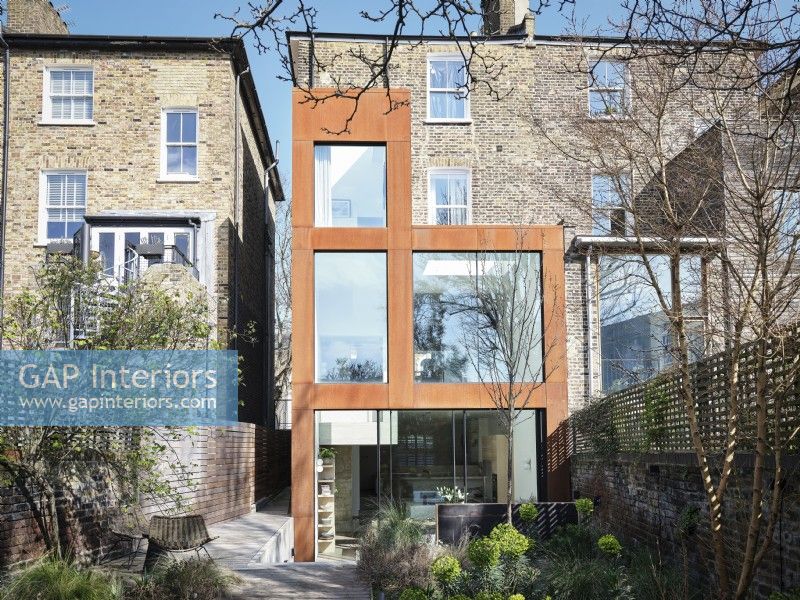 Modern extension with glass windows and brown borders