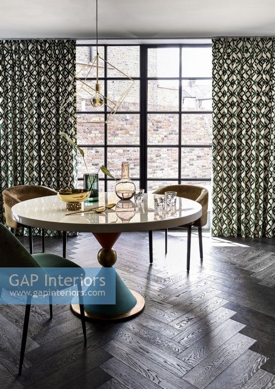 Dining table with patterned curtains