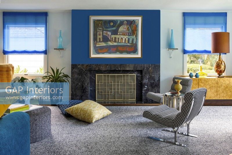 Living Room furnishings in blue, gold and grey colours.