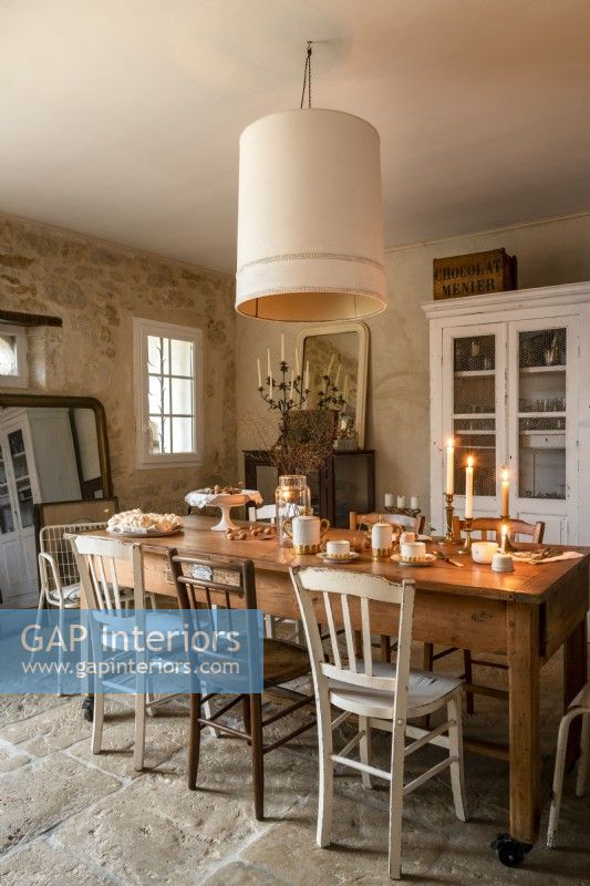Country dining room with stone flooring 