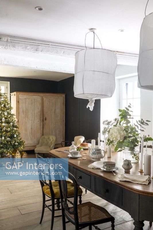 Grey and white country dining room decorated for Christmas
