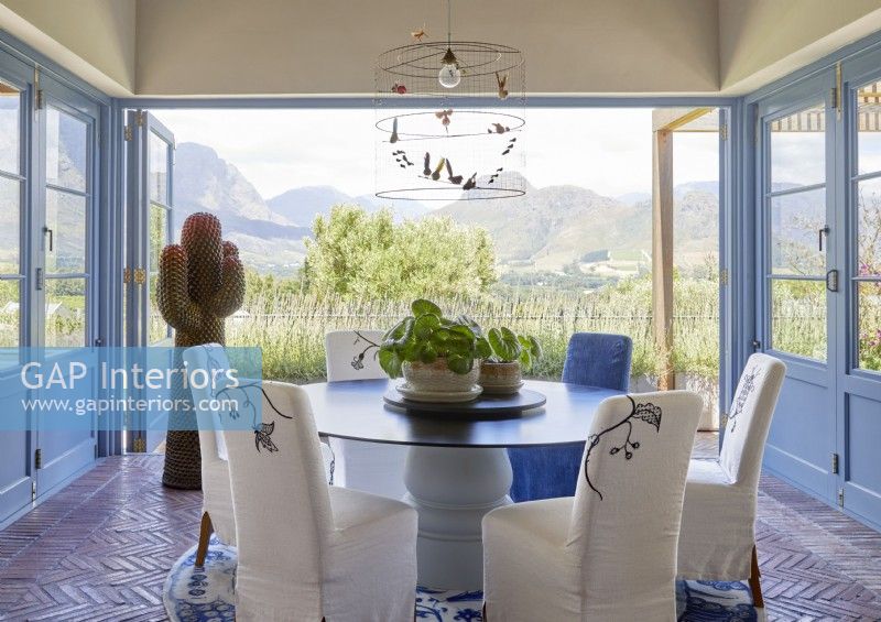 Dining area with stunning views of countryside through picture window