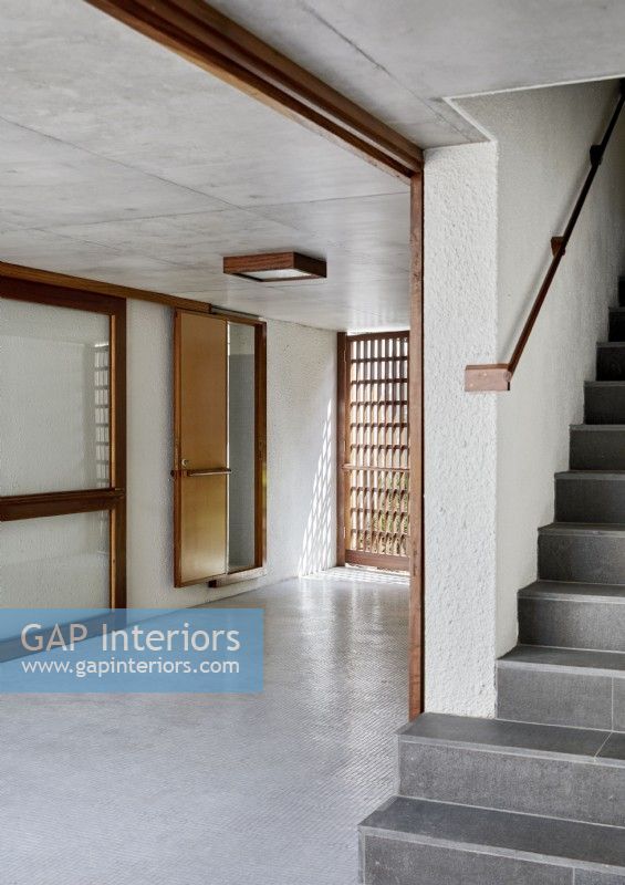 Concrete staircase in minimal hallways