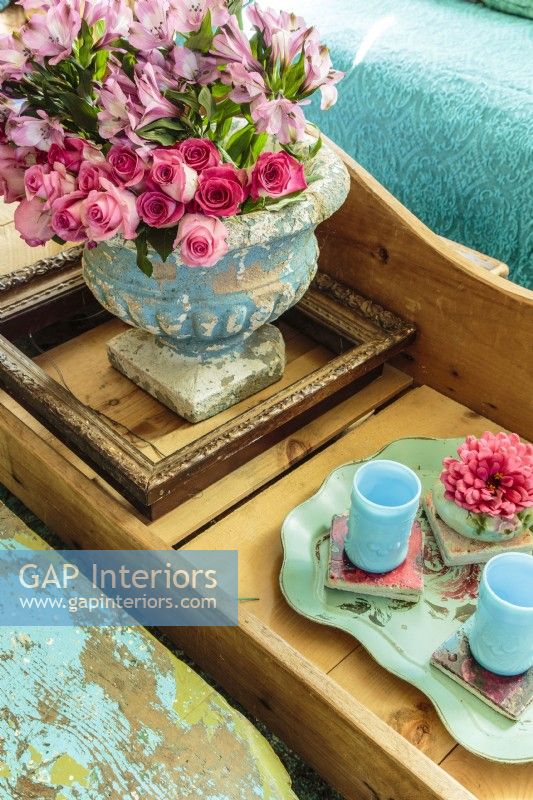 Expect the unexpected! Jennifer repurposed a bare bones Victorian fainting couch as a coffee table.