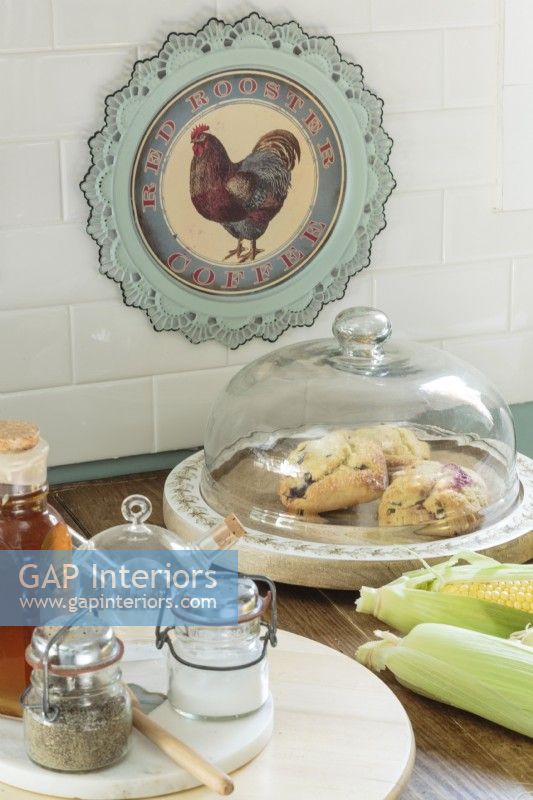 A vintage rooster plate imparts character.