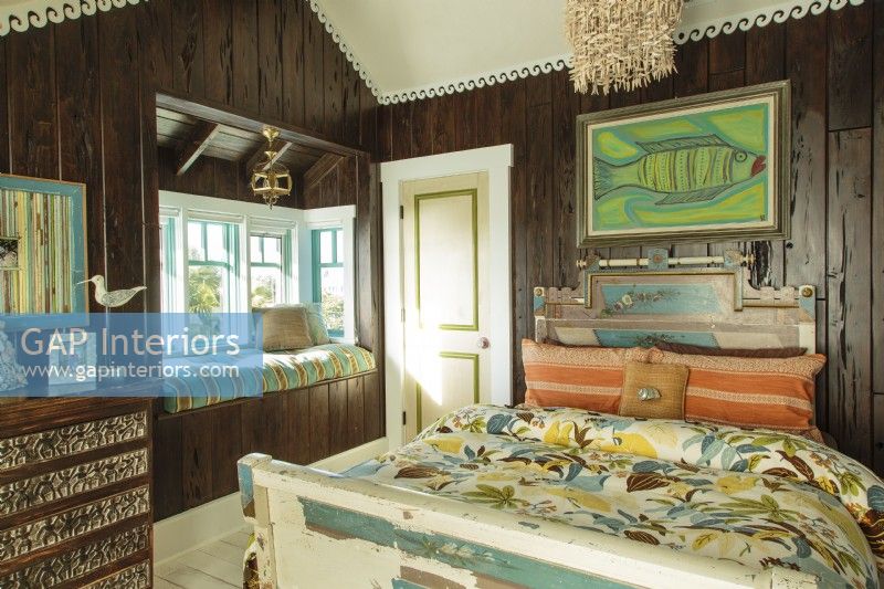  For her eldest son, Kandy conjured a funky, old Florida feel that starts with reclaimed cypress paneling.