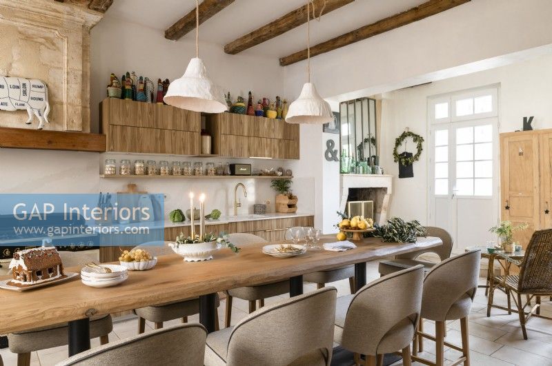 Modern country kitchen diner decorated for Christmas
