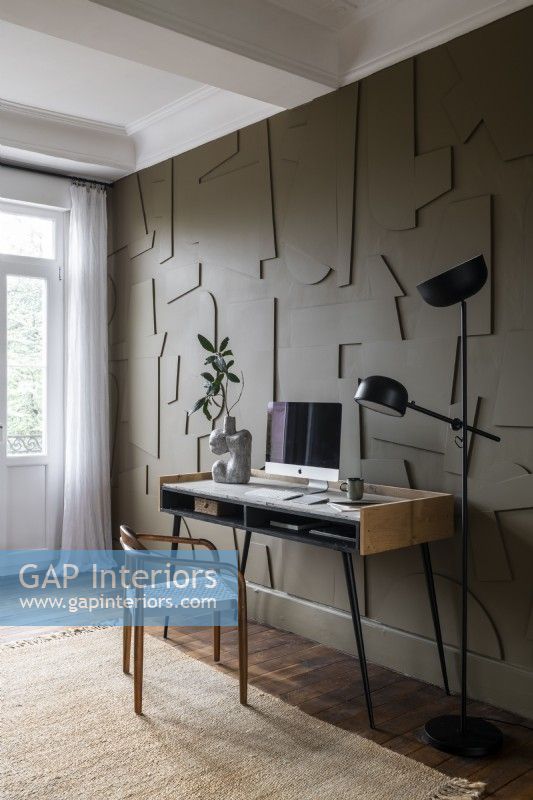 Contemporary textured painted wall in study