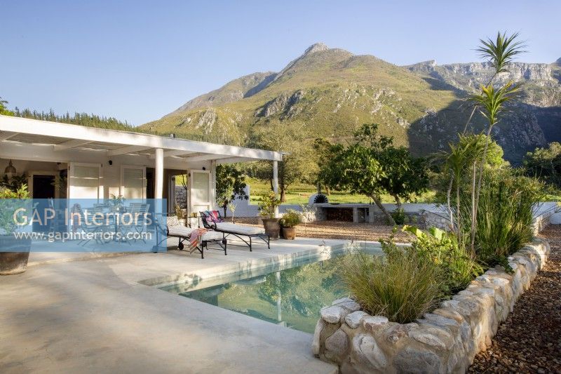 Courtyard with swimming pool and mountain views