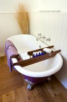 Country bathroom with roll top bath