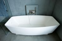 Modern contemporary bath in slate tiled bathroom