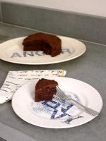 Detail of plates with chocolate cake