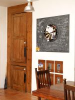 Country style dining room with dart board on wall