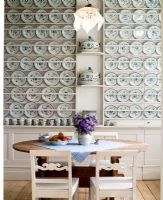 Country style dining room with china on display