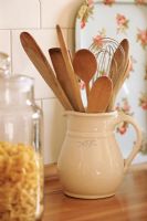 View of wooden spoons in jug