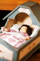 Close-up of child's doll crib