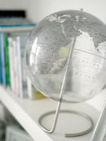 Detail of globe on shelf