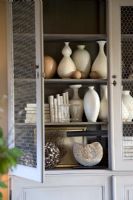 Vases and pots in country dresser 