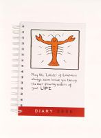 Close-up of a diary with a lobster