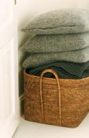 Basket with blankets and pillows