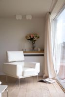White leather chair in modern living room 