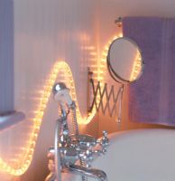 Illuminated light through bathroom sink