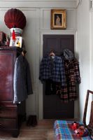 Coats hanging in hallway 