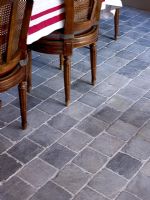 Stone floor tiles in dining room