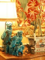 Close up of Asian dog sculptures on a dresser