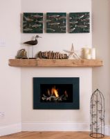 Fireplace with nautical accesories on shelf