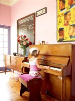 A little girl playing the piano
