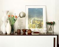 Collection of vases and jugs on sideboard