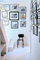 Modern hallway with collection of frammed pictures