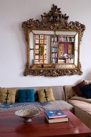 Baroque mirror in modern living room 