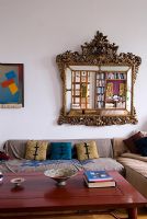 Baroque mirror in modern living room 