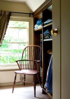 Windsor chair in country bedroom 