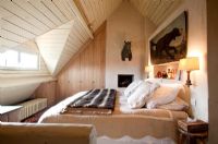 Modern bedroom in attic space