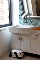 Modern bathroom with childs step to sink 