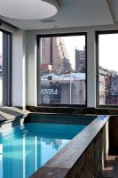 Indoor swimming pool with views of New York 