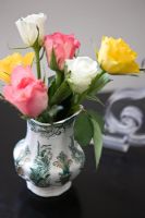 Detail of roses in small vase