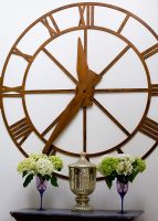 Large wooden wall clock detail