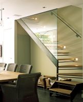 Modern staircase to dining room 