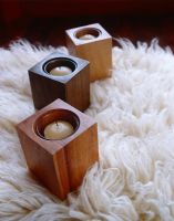 Candles in wooden holders, detail