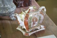 Ornate antique tea pot, detail