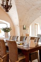 Country dining room with vaulted ceiling