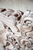 Close up of ornate carved armchair 
