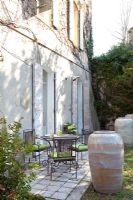 Country house terrace with table and chairs