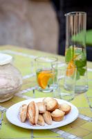 Food and accessories on outdoor dining table