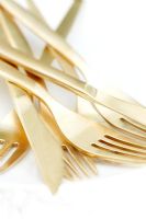 Detail of gold cutlery 